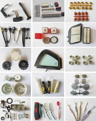 Macchine per stampaggio a iniezione verticale per bordi di automobili